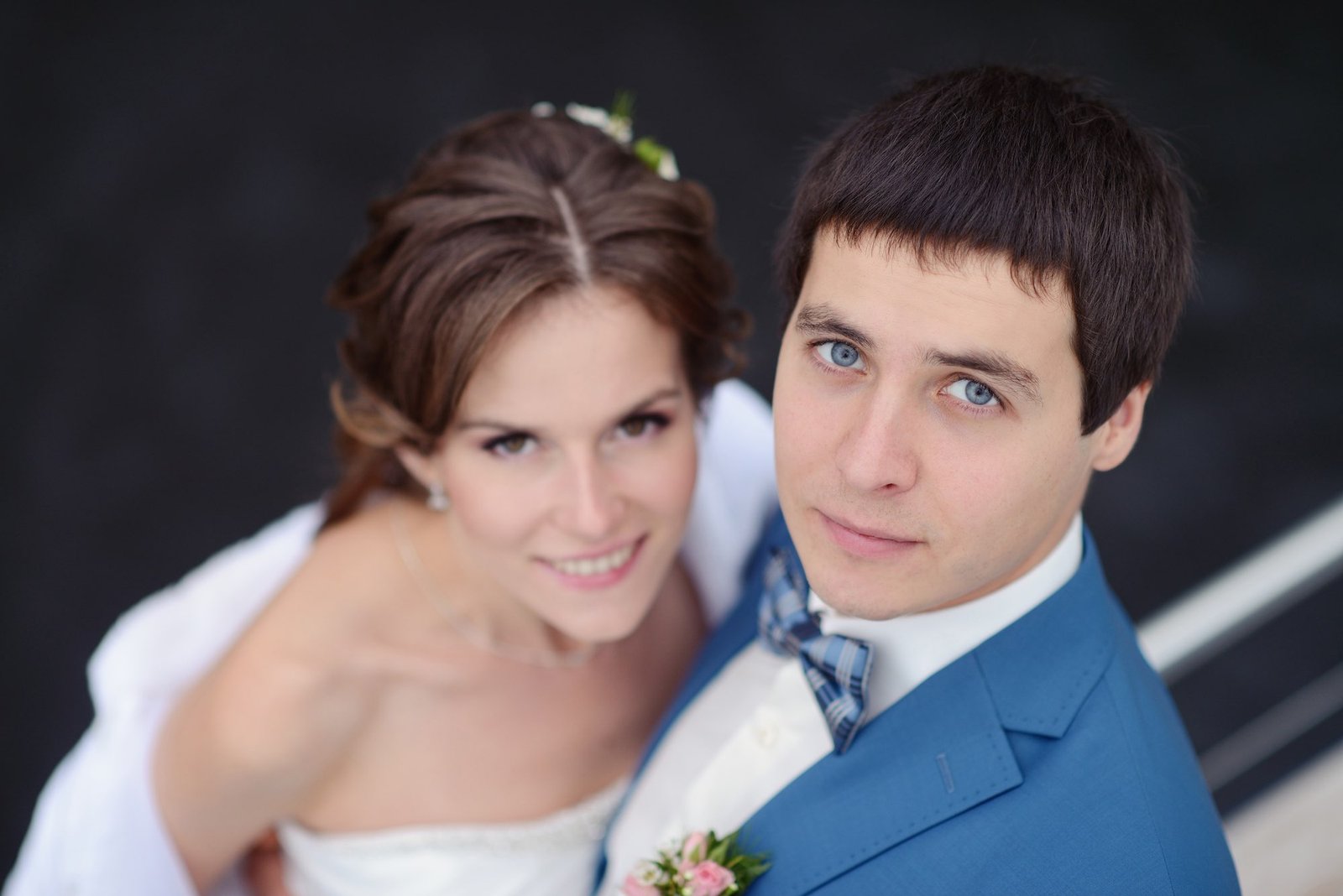 Wedding couple hugging on a yacht