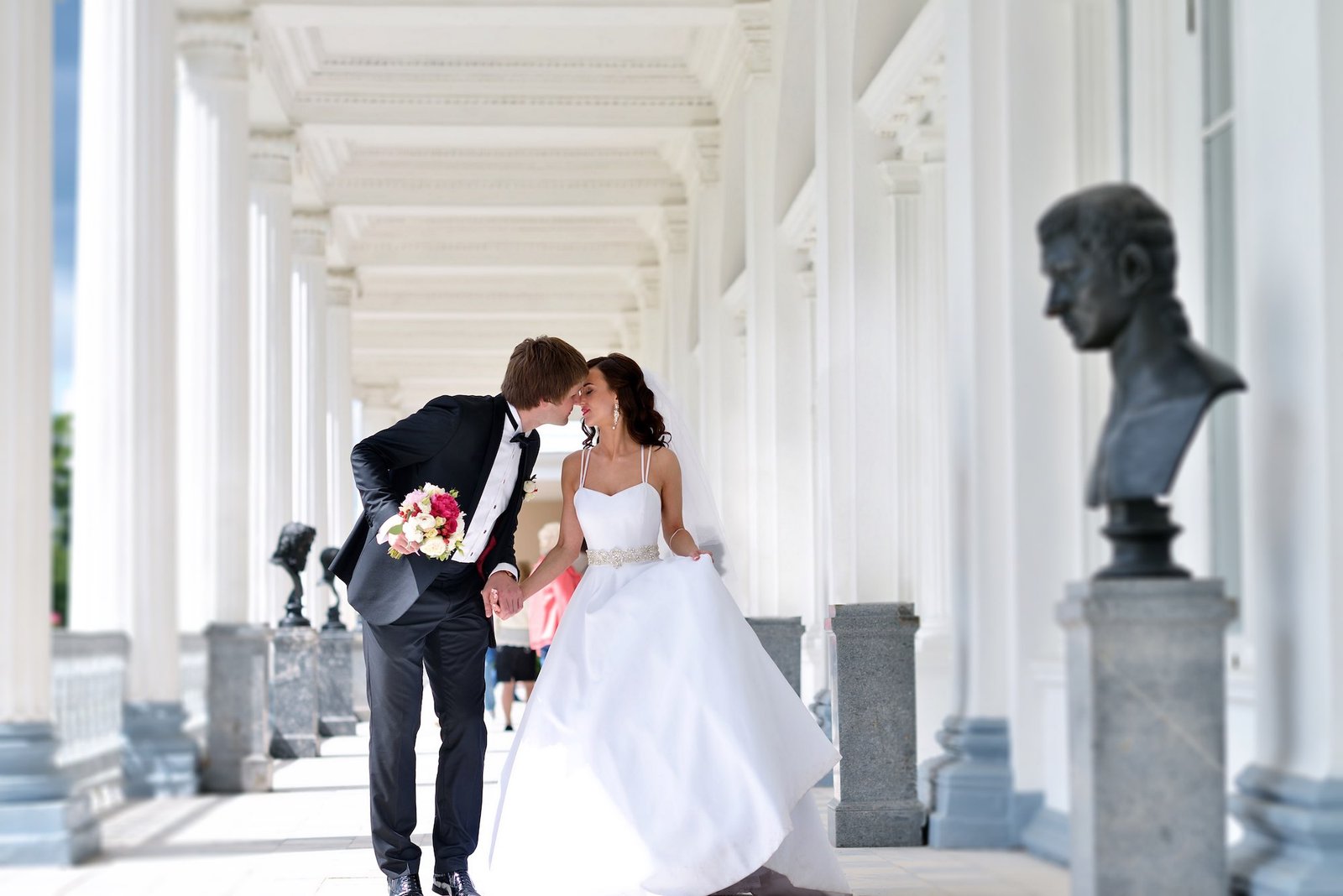 Wedding couple embracing in nature