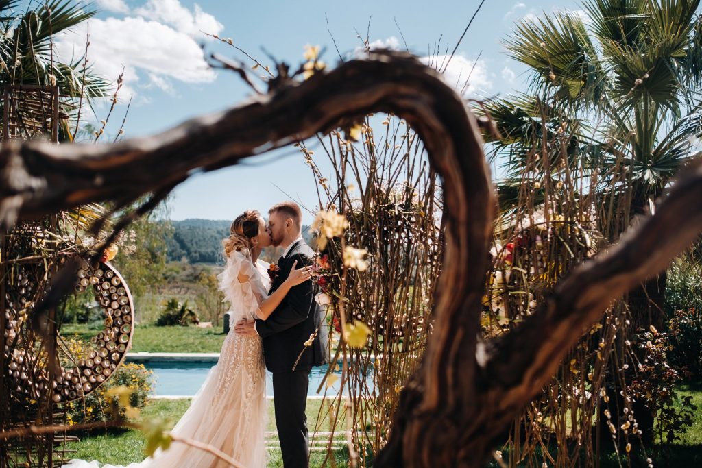 A wedding couple near a villa in France